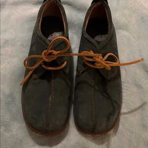 Born beautiful green tie shoes or loafers.